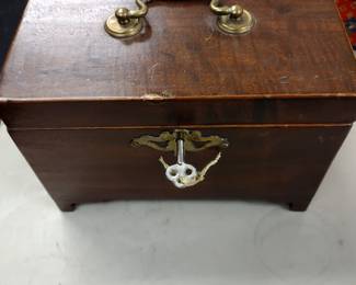 Antique tea caddy with key.