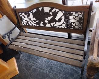 Bench with iron back.