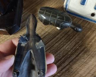 horn carved turtles.