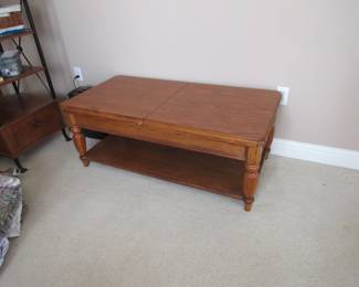 Coffee table that converts to a TV stand