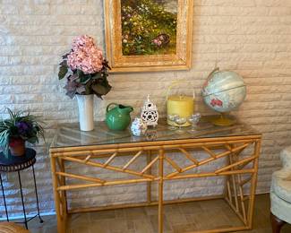 Rattan sofa table , vintage globe & plastic ice bucket. 