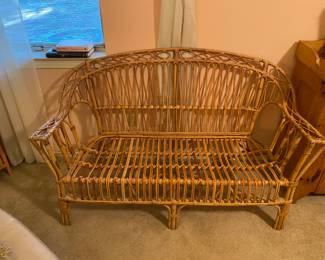 Natural colored rattan love seat