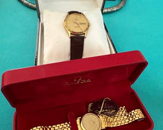 2 Omega Watches