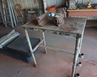 work table, railroad iron, vise