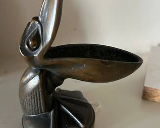 Vintage brass pelican ashtray.