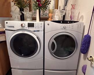 Electric dryer, approx 7 yrs old, washer 5 yrs old.