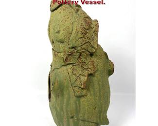 Lot 902 Organic Free Form Glazed Pottery Vessel.