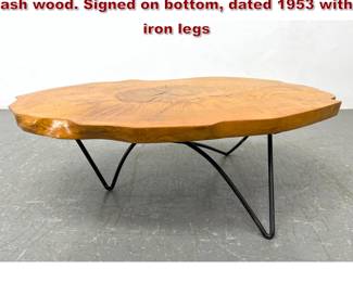 Lot 1007 Coffee table from a single slab of ash wood. Signed on bottom, dated 1953 with iron legs