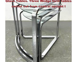 Lot 756 MILO BAUGHMAN for DIA Chrome Glass Tables. Three Wedge form tables swivel out from central upright l