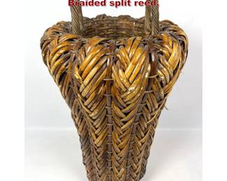 Lot 1006 Tall 2 Handled Split Reed Basket. Braided split reed.