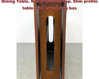 Lot 991 Mid Century Modern Drop Side Dining Table. Richly grained top. Slim profile table with expanding bas