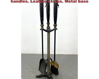 Lot 942 Mid Century Fireplace Tools. Wood handles. Leather straps. Metal base
