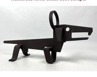 Lot 618 Iron Figural Dog Sculpture. Humorous form. Small boot scrape.
