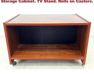 Lot 994 Danish Modern Rosewood Open Storage Cabinet. TV Stand. Rolls on Casters. 