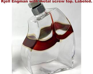 Lot 779 Kosta Boda Macho Decanter by Kjell Engman with metal screw top. Labeled.