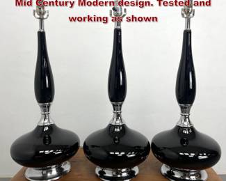Lot 728 3pc Black and Chrome Table Lamps. Mid Century Modern design. Tested and working as shown 