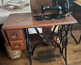 1872 sewing machine SINGER / not for sale sign is for a cedar chest in the back.