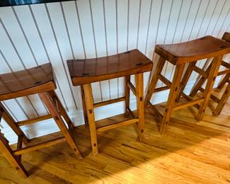 Set of four wooden bar stools