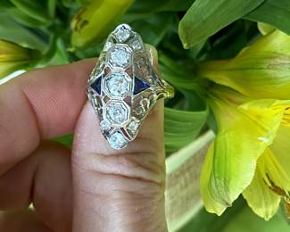 #101 - $1,450. Art Deco Dinner Ring - 18kt white gold filigree, circa 1930's diamonds 0.65 carats - H/1 - Si and 2 trillion sapphires. Size 5.25