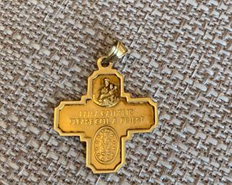 #21 - 14kt gold cross $250 
