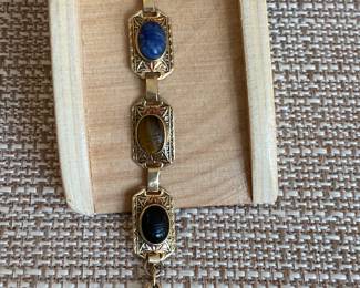 #12 - 14kt gold bracelet with scarab multi color $250 