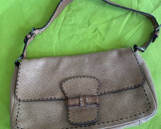 #99 - Prada small handbag leather light brown purse 	$100 - Clean condition but used. 