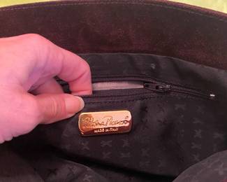 103 - Paloma Picasso brown swede purse in mint condition, transfor to a clutch or small purse.  $120