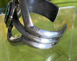 #86 - $150 Unsigned/unmarked Arts & Crafts handcrafted silver bangle with turquoise. 