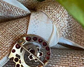 #63 - 10Kt garnet brooch $195