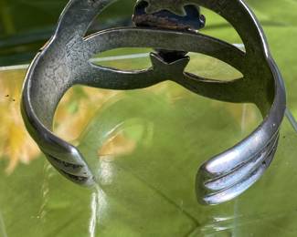 #86 - $150 Unsigned/unmarked Arts & Crafts handcrafted silver bangle with turquoise. 