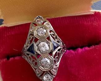 #101 - $1,450. Art Deco Dinner Ring - 18kt white gold filigree, circa 1930's diamonds 0.65 carats - H/1 - Si and 2 trillion sapphires. Size 5.25