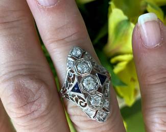 #101 - $1,450. Art Deco Dinner Ring - 18kt white gold filigree, circa 1930's diamonds 0.65 carats - H/1 - Si and 2 trillion sapphires. Size 5.25