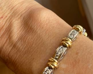 #51 - Purchased at Bere Jewelers, white and yellow gold round diamonds bracelet. $1575. 