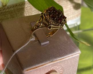 #91 - 14kt gold garnet flower ring. Intricate setting. size 6 - $240