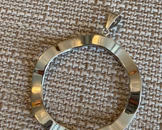 #19 - 14kt white gold open pendant- $150 