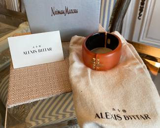 #49 Alexis Bittar orange lucite cuff (7" diam) with rhinestine - with original felt bag and Neiman and Marcus box.  $130