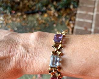 #105 - $800 14kt testedMulti colored stones emerald cut 7"wrist 