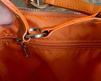 #59 - Longchamps orange satin purse - 2 inside zipper pockets - very good condition - $90