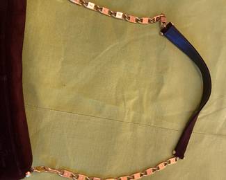 103 - Paloma Picasso brown swede purse in mint condition, transfor to a clutch or small purse.  $120