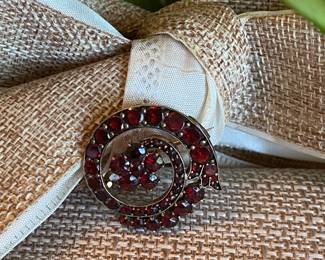 #63 - 10Kt garnet brooch $195