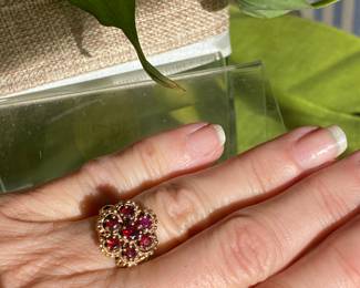 #91 - 14kt gold garnet flower ring. Intricate setting. size 6 - $240