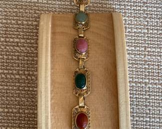 #12 - 14kt gold bracelet with scarab multi color $250 