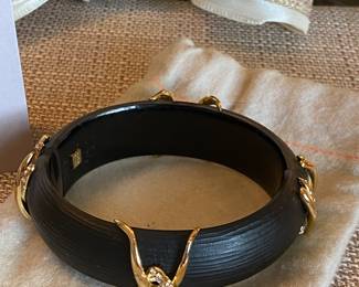#52 - Alexis Bittar lucite cuff bracelet - black and gold & rhinestone. with original felt bag and card. $130