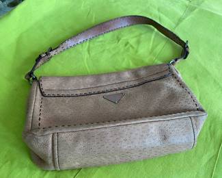 #99 - Prada small handbag leather light brown purse 	$100 - Clean condition but used. 
