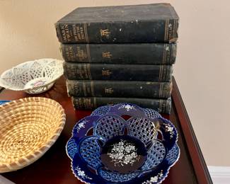 Pierced porcelain dishes, Gullah Gullah basket, mark Twain antique books