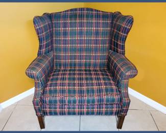 One of a Pair of Matching Wingback Chairs