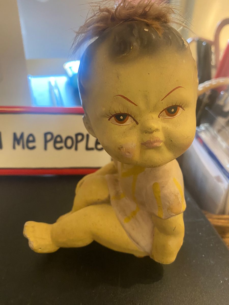 Mascot Grumpy baby awaits you at checkout 