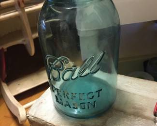 Ball jars with lids...at least two dozen...get em while they last!