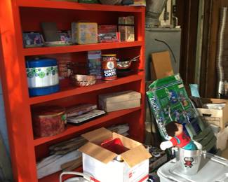 Handmade solid wood storage shelves...one red, one blue, same size, and a yellow one that matches but is a bit smaller.  Amazing amount of storage for any room of the house OR a garage or workshop !