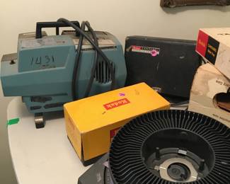 So much KODAK Photography equipment  Carousels for slides, a projector, many different components...all in good condition.